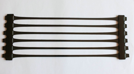HDPE PE PP ομοιοκατευθυνόμενη Uniaxial Roadbed Geogrid ενίσχυση